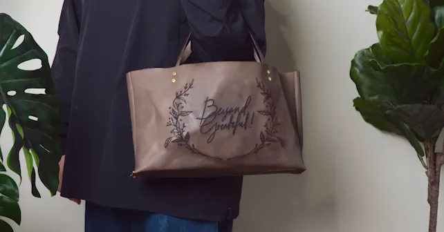 Personalized leather bag engraved with Beambox II