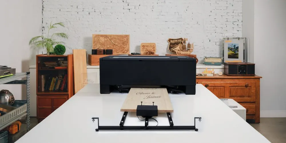 Auto Feeder add-on advancing material through a Beambox II