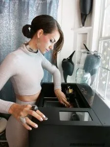 Anouk Wipprecht modeling a detailed section of the Pangolin dress