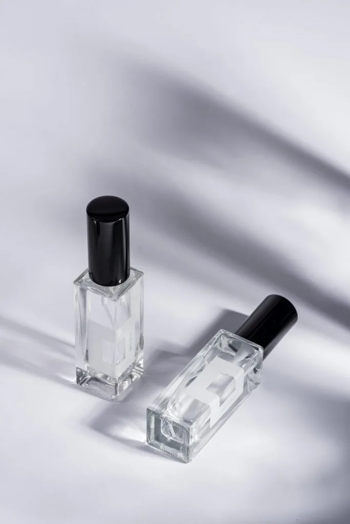 An odorfunder perfume bottle photographed against a pale background