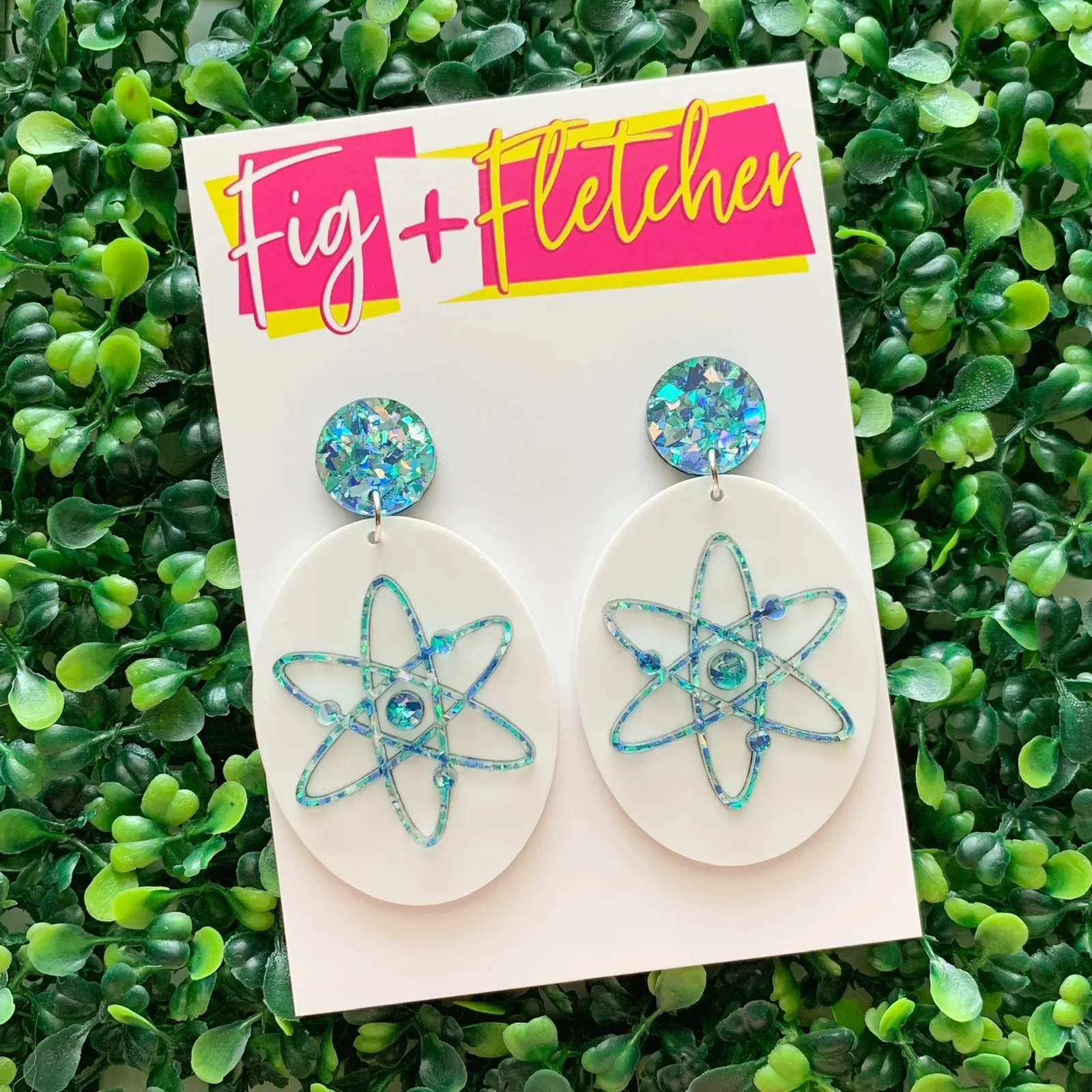 White and turquoise glitter acrylic atom earrings by Fig and Fletcher