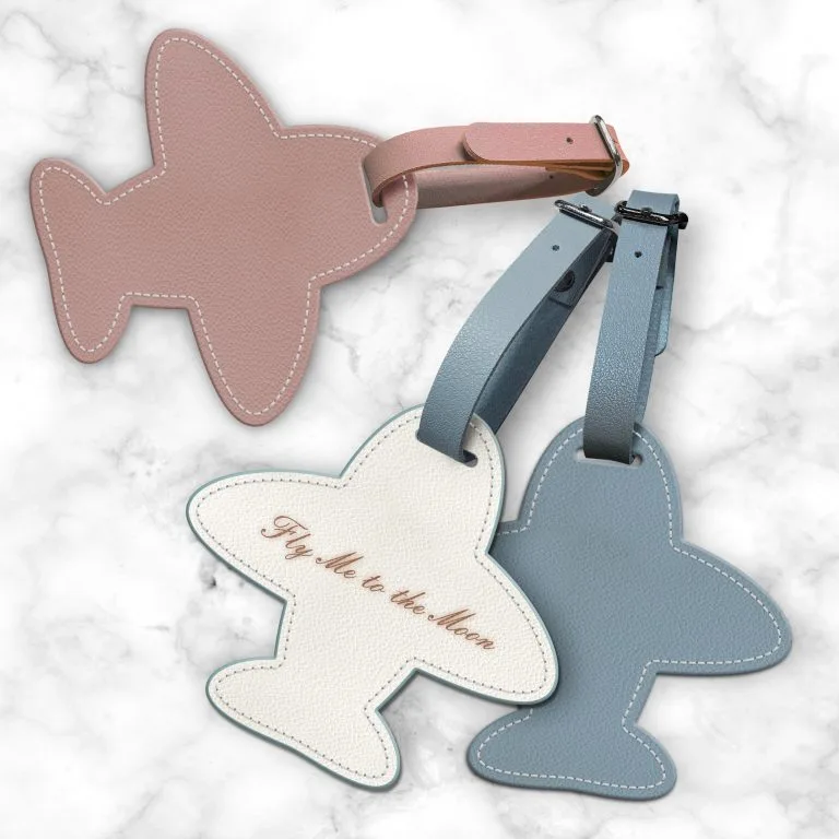 Airplane-shaped leather luggage tags by Mr. sheep
